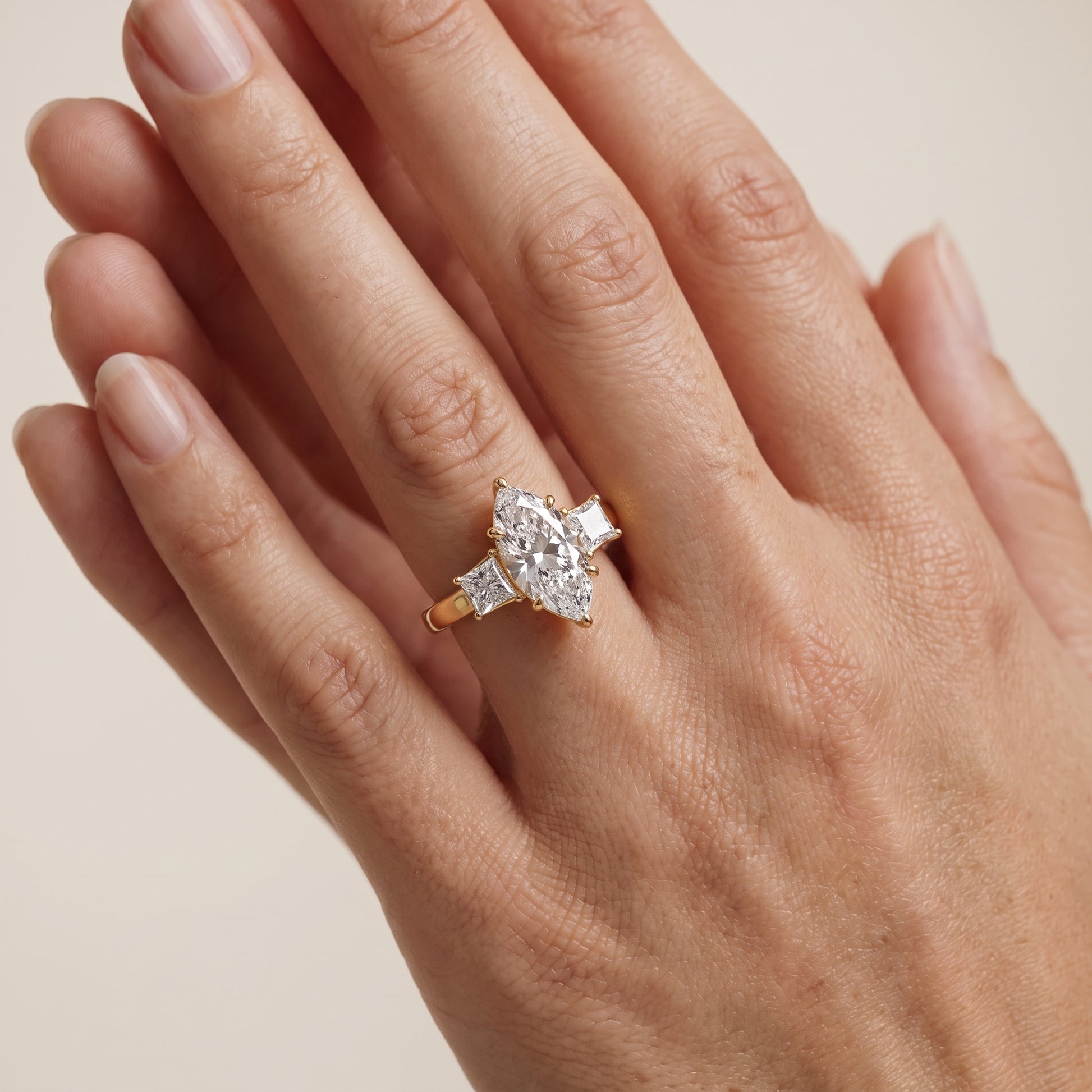 Selena Three-Stone Basket Marquise Diamond Ring in Yellow Gold - lifestyle.jpg
