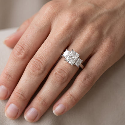 Zoe Three-Stone Radiant Diamond Engagement Ring in Platinum - lifestyle.jpg