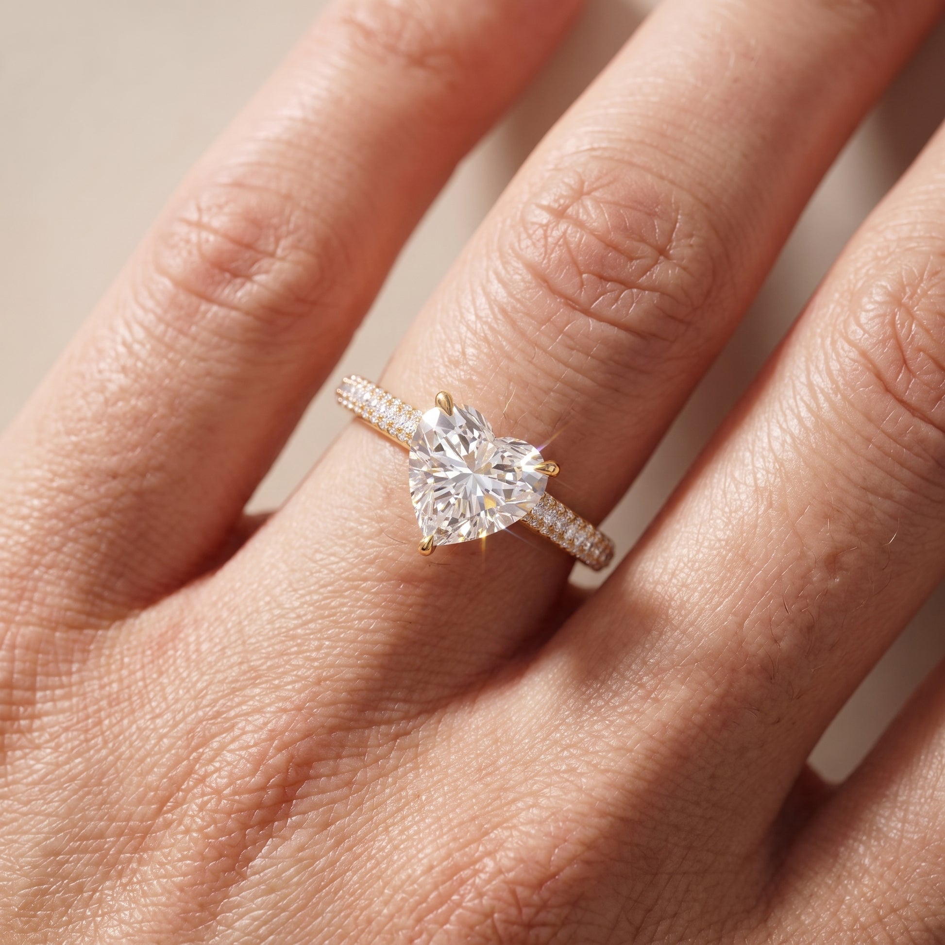 Della Hidden Halo Pavé Heart Diamond Engagement Ring in Yellow Gold - lifestyle.jpg