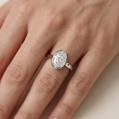 Jolie Bezel Solitaire Oval Diamond Engagement Ring in Silver - lifestyle.jpg