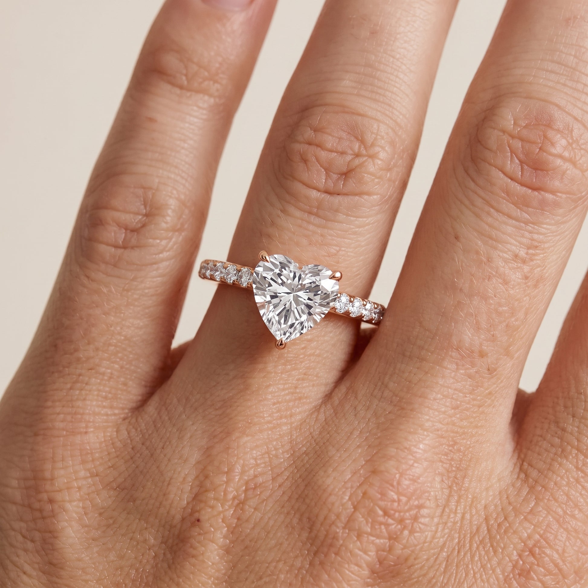 Thea Hidden Halo Pavé Heart Diamond Engagement Ring in Rose Gold - lifestyle.jpg