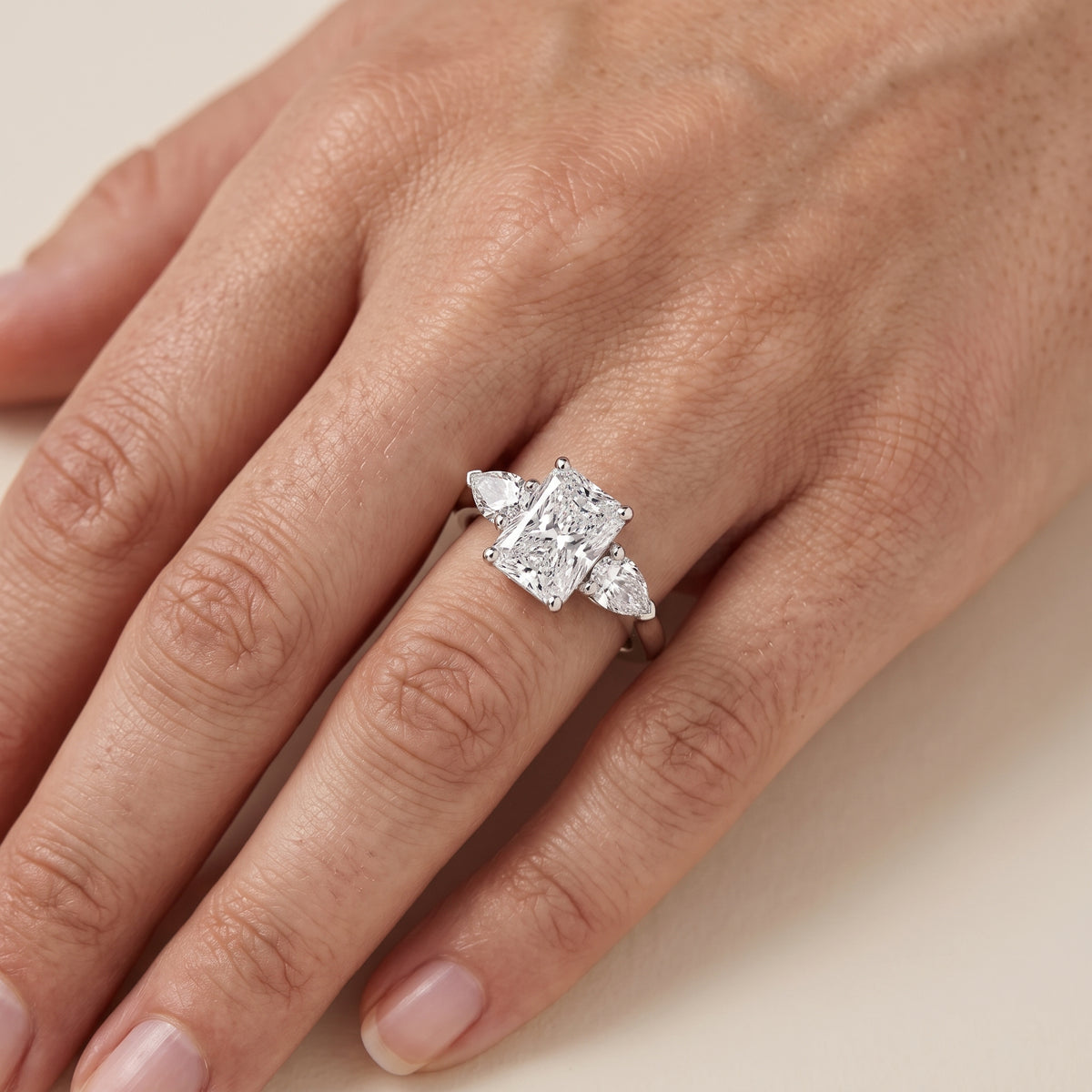 Sophia Three-Stone Radiant Diamond Engagement Ring in White Gold - lifestyle.jpg