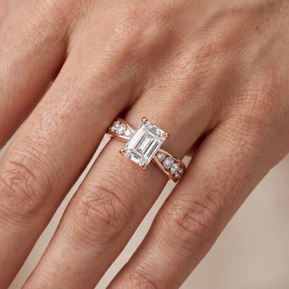 Noor Channel Set Sidestone Emerald Diamond Engagement Ring in Rose Gold - lifestyle.jpg