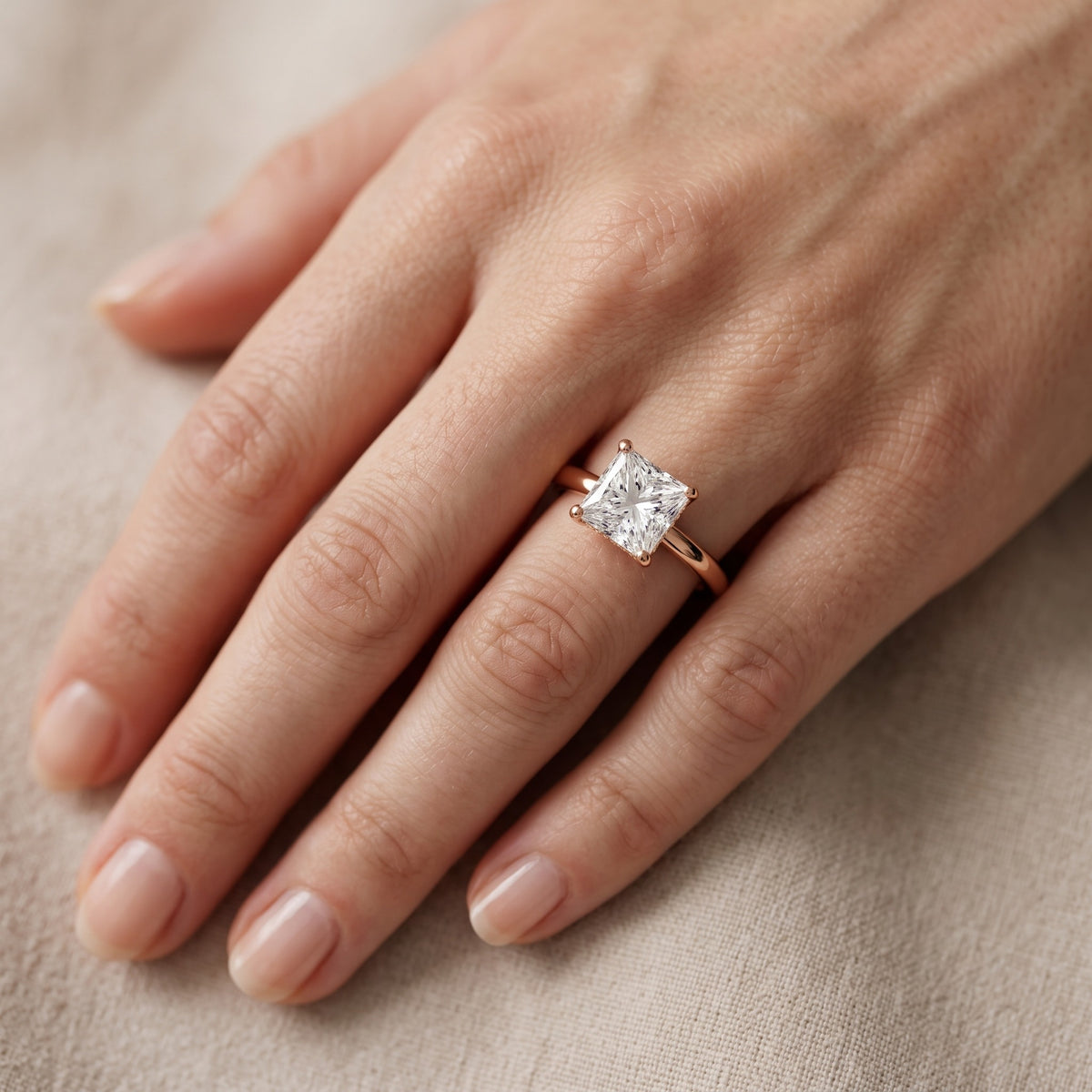 Charlotte Charm Solitaire Princess Diamond Engagement Ring in Rose Gold - lifestyle.jpg