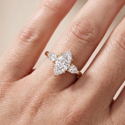 Mirabel Three-Stone Marquise Diamond Engagement Ring in Yellow Gold - lifestyle.jpg