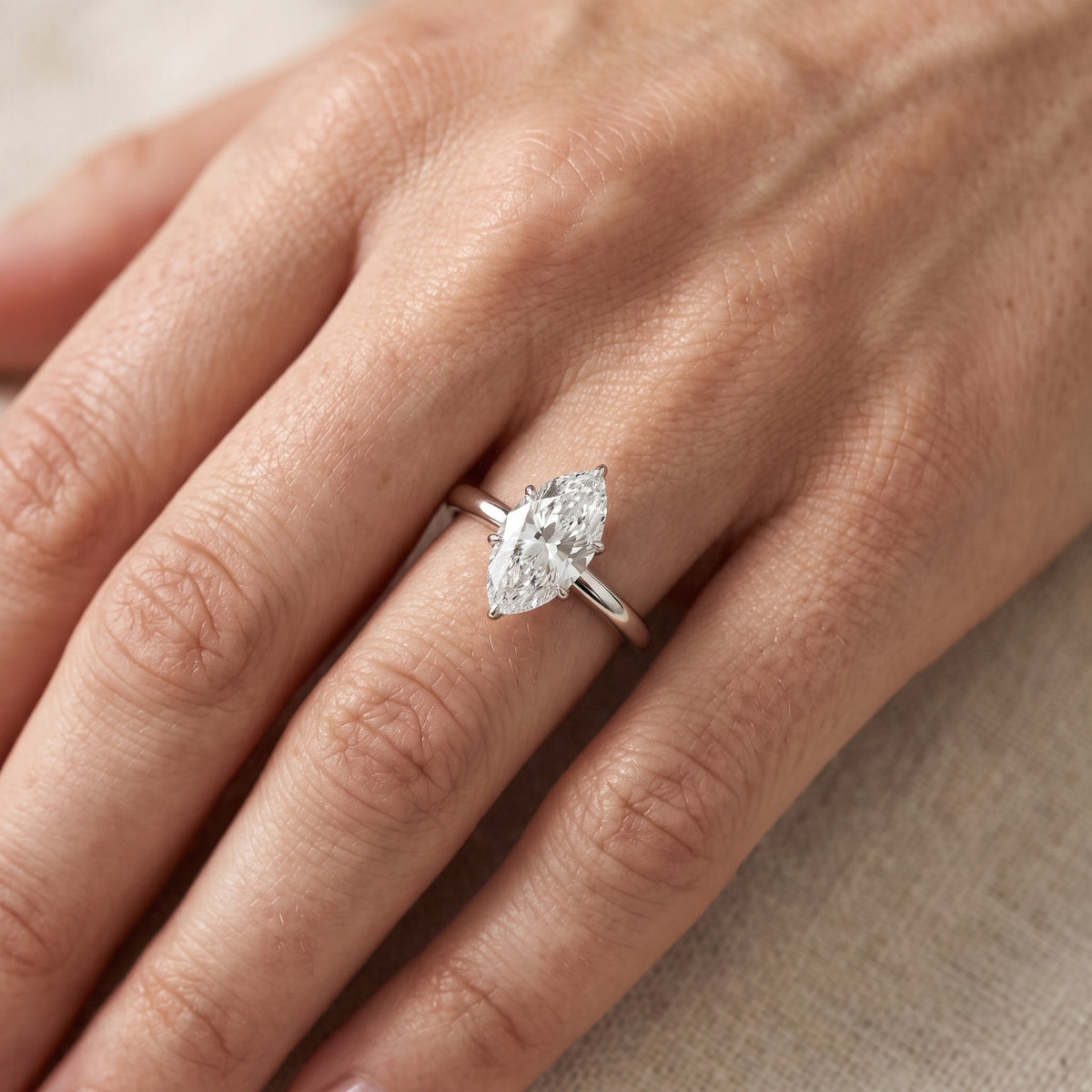 Serena Blossom Marquise Solitaire Engagement Ring in Platinum - lifestyle.jpg