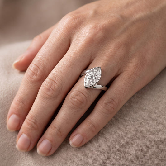 Marigold Bezel Bypass Marquise Diamond Engagement Ring in Platinum - lifestyle.jpg