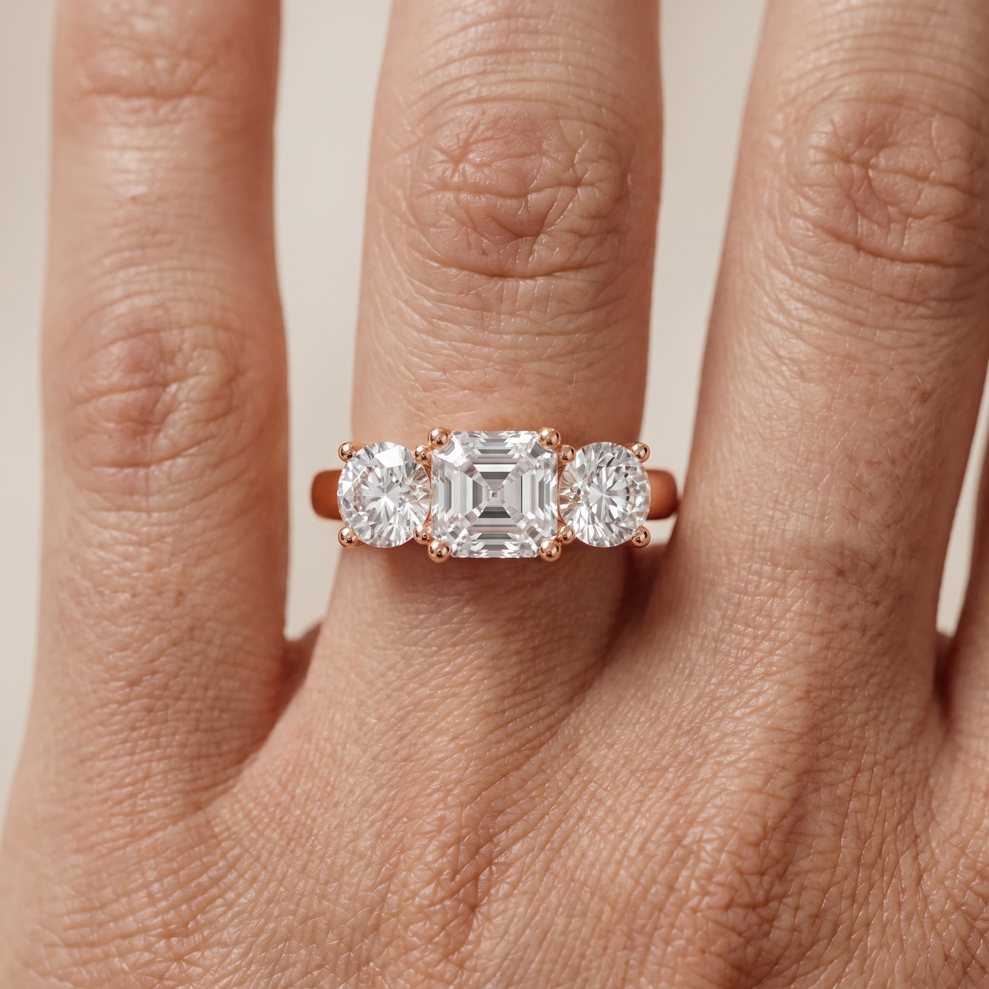 Callie Three-Stone Trellis Asscher Diamond Ring in Rose Gold - lifestyle.jpg