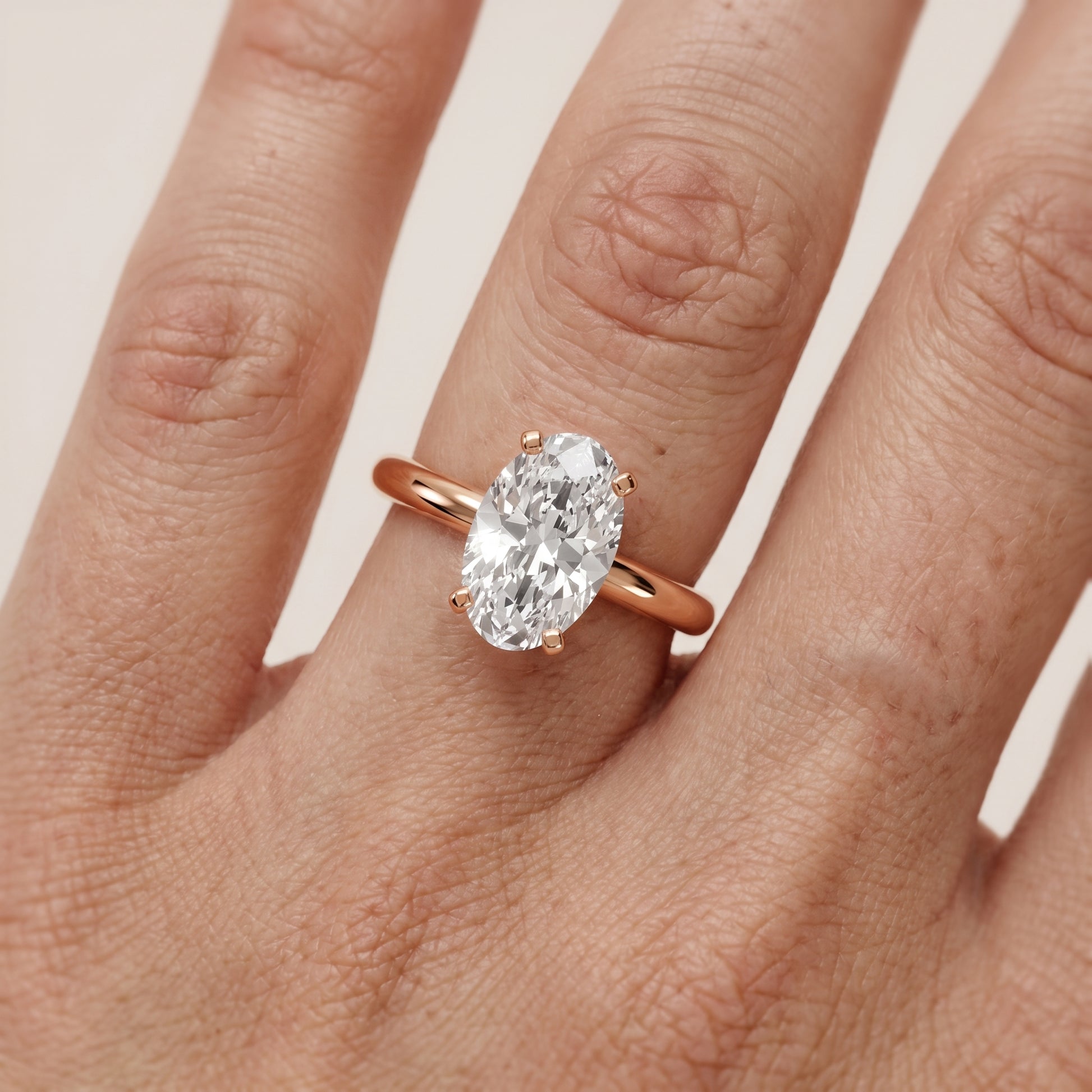 Wren Solitaire Oval Diamond Ring in Rose Gold - lifestyle.jpg