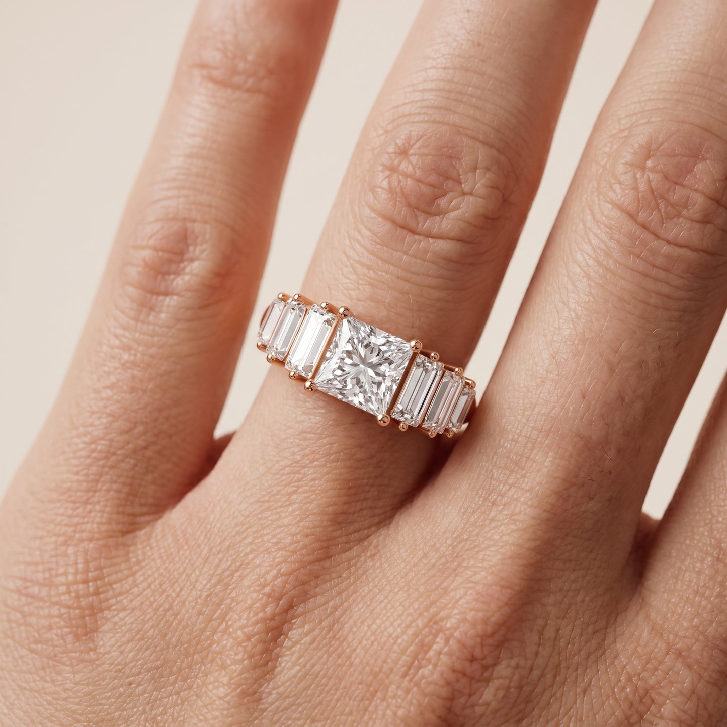 Mara Sidestone Baguette Accent Princess Diamond Engagement Ring in Rose Gold - lifestyle.jpg