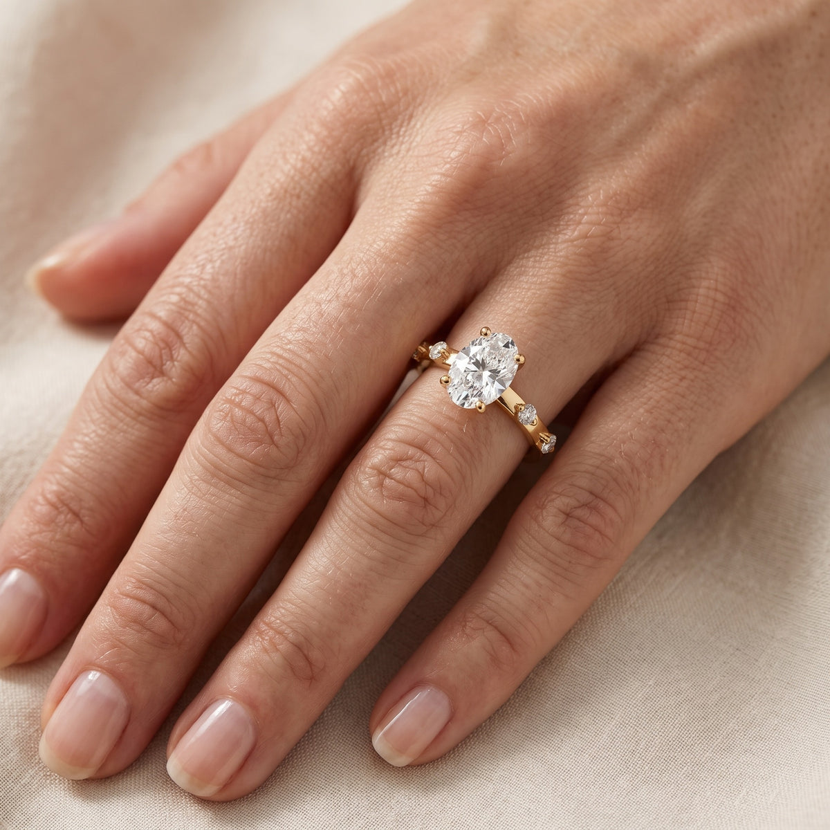 Elena Radiance Oval Diamond Engagement Ring in Yellow Gold - lifestyle.jpg