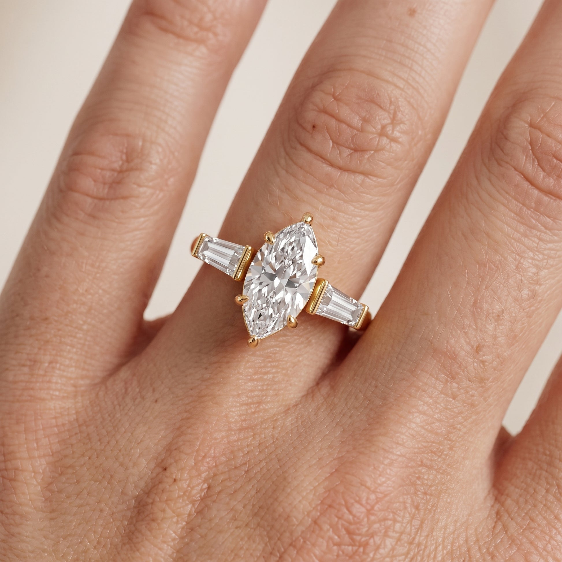 Layla Tapered Baguette Marquise Diamond Ring in Yellow Gold - lifestyle.jpg