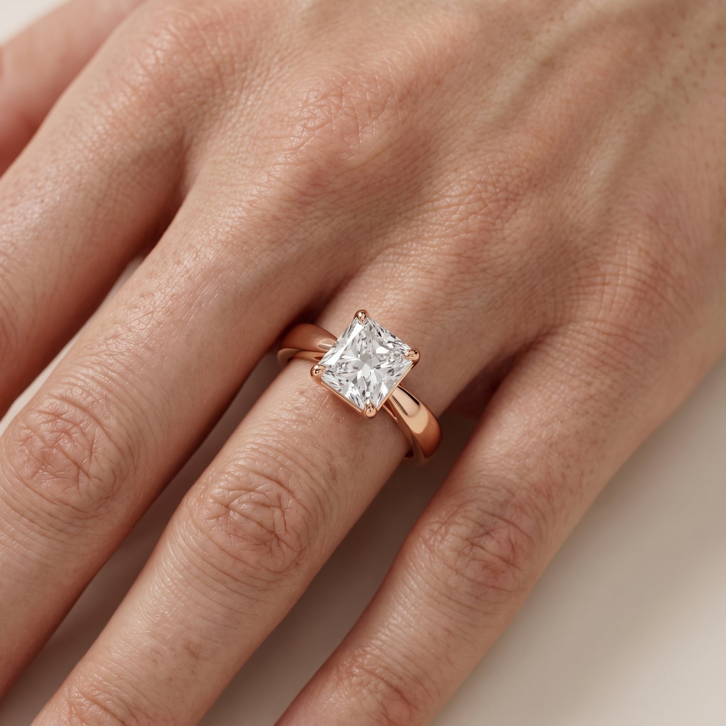 Lucia Solitaire Six-Prong Radiant Diamond Engagement Ring in Rose Gold - lifestyle.jpg