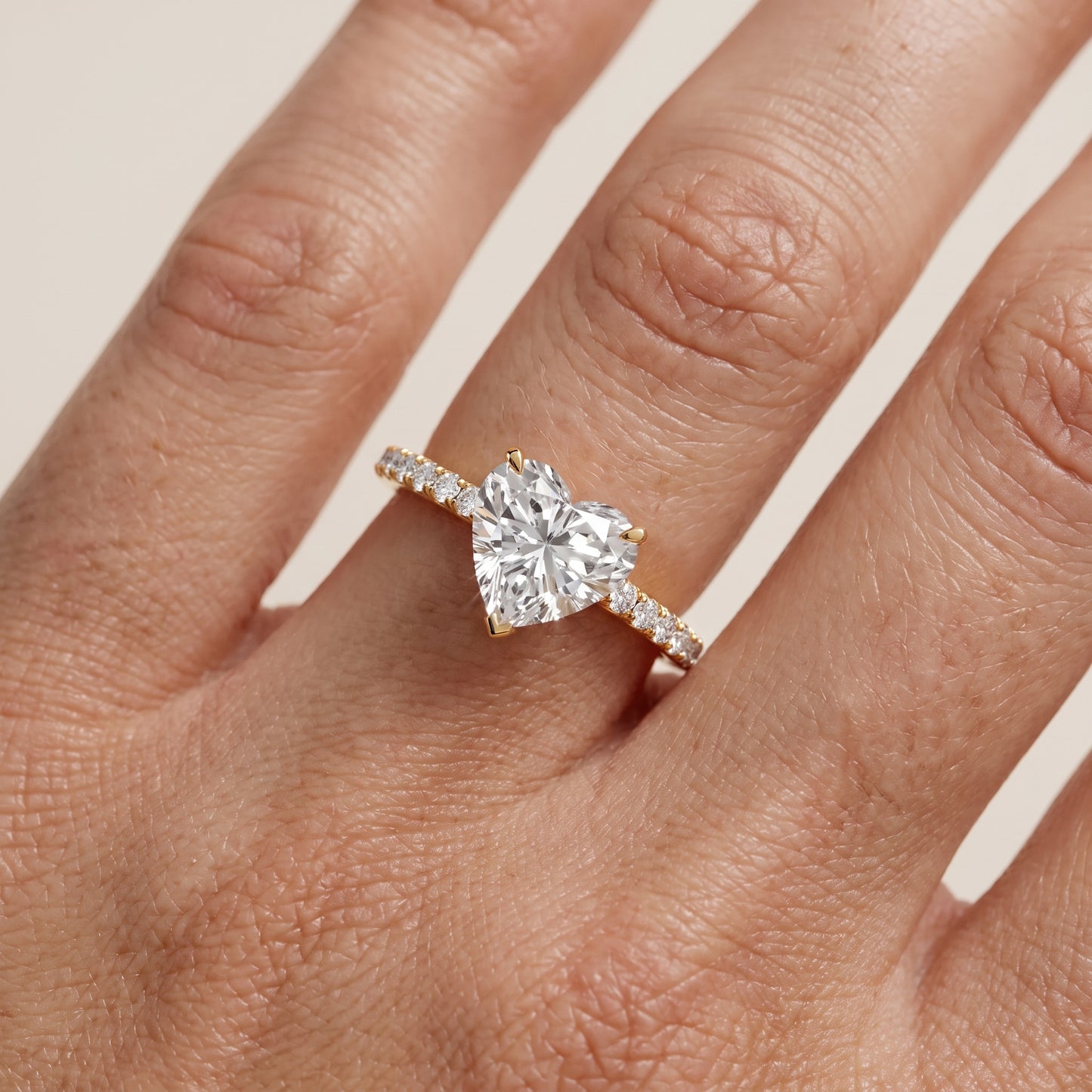 Juna French Pavé Solitaire Heart Diamond Engagement Ring in Yellow Gold - lifestyle.jpg