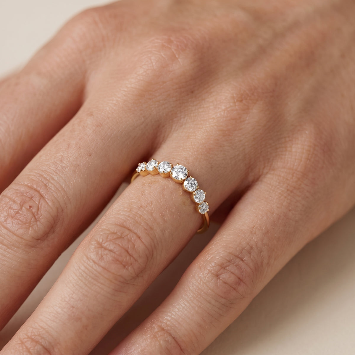 Victoria Curved Round Diamond Stackable Ring in Yellow Gold - lifestyle.jpg