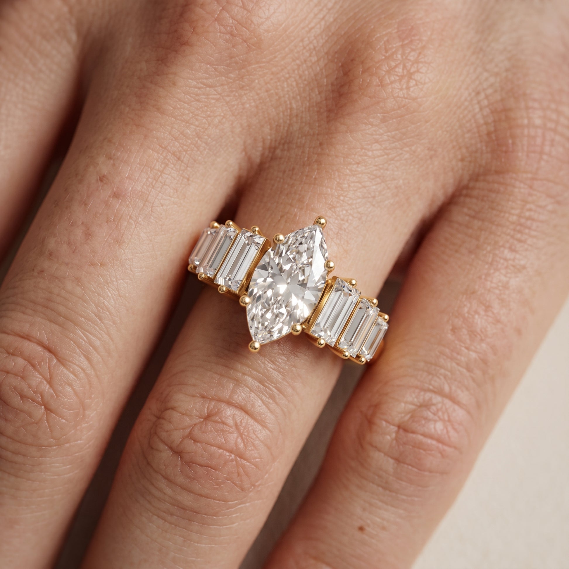 Mara Sidestone Baguette Accent Marquise Diamond Engagement Ring in Yellow Gold - lifestyle.jpg