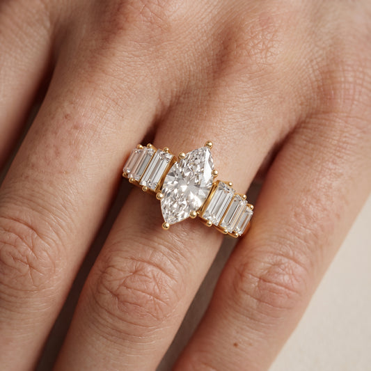 Mara Sidestone Baguette Accent Marquise Diamond Engagement Ring in Yellow Gold - lifestyle.jpg