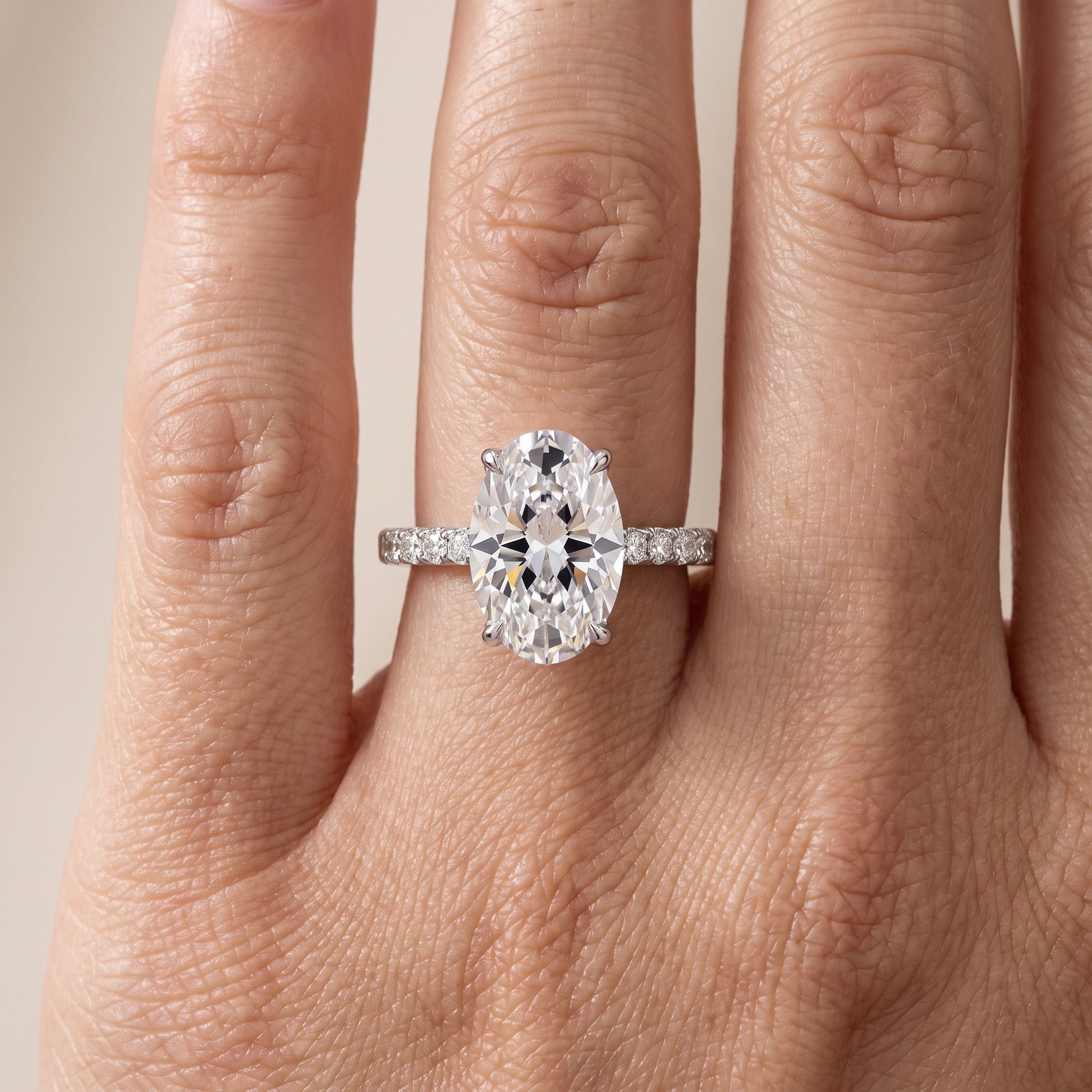 Ione Solitaire Pavé Oval Diamond Engagement Ring in White Gold - lifestyle.jpg