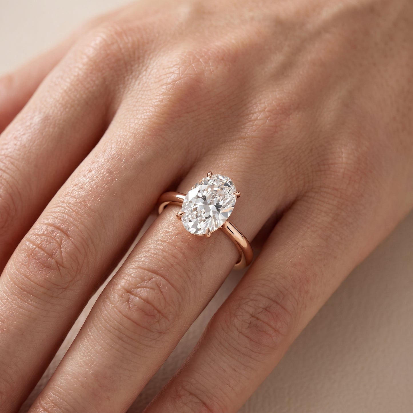Evie Solitaire Six-Prong Oval Diamond Engagement Ring in Rose Gold - lifestyle.jpg