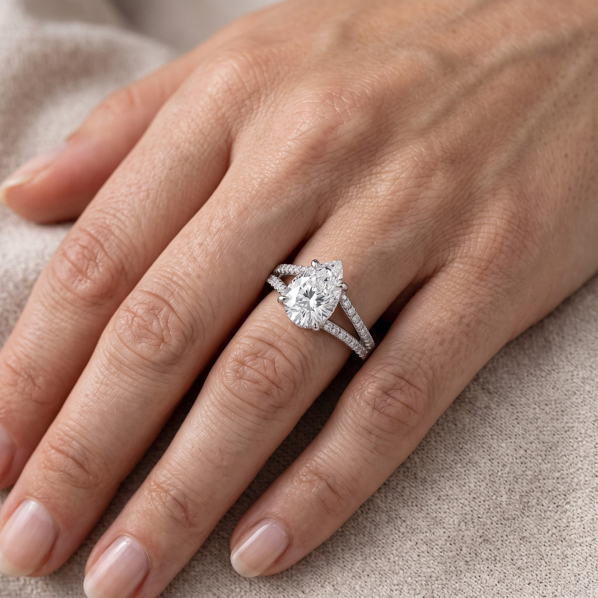 Eternal Embrace Solitaire Pear Diamond Engagement Ring in White Gold - lifestyle.jpg