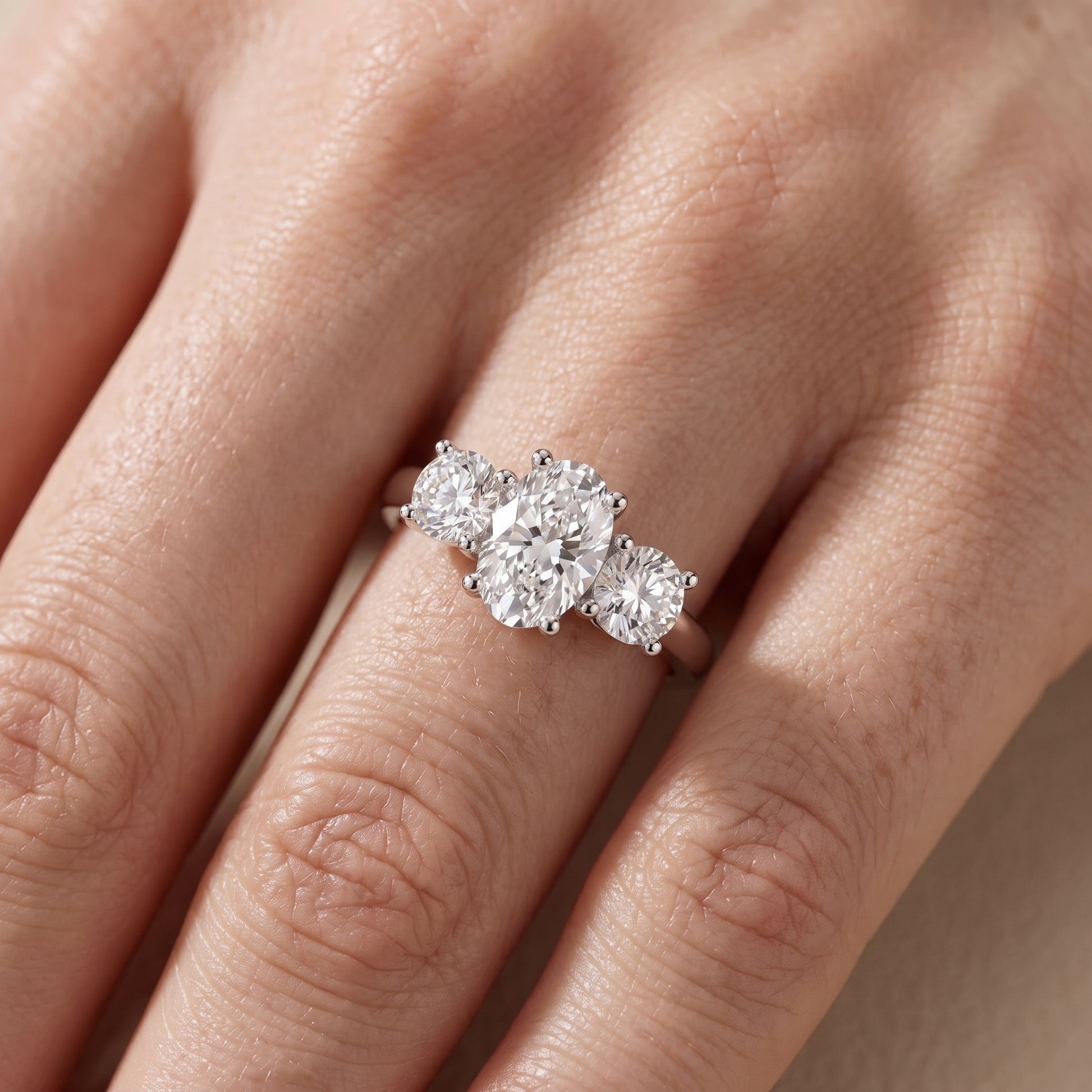 Callie Three-Stone Trellis Oval Diamond Engagement Ring in Silver - lifestyle.jpg
