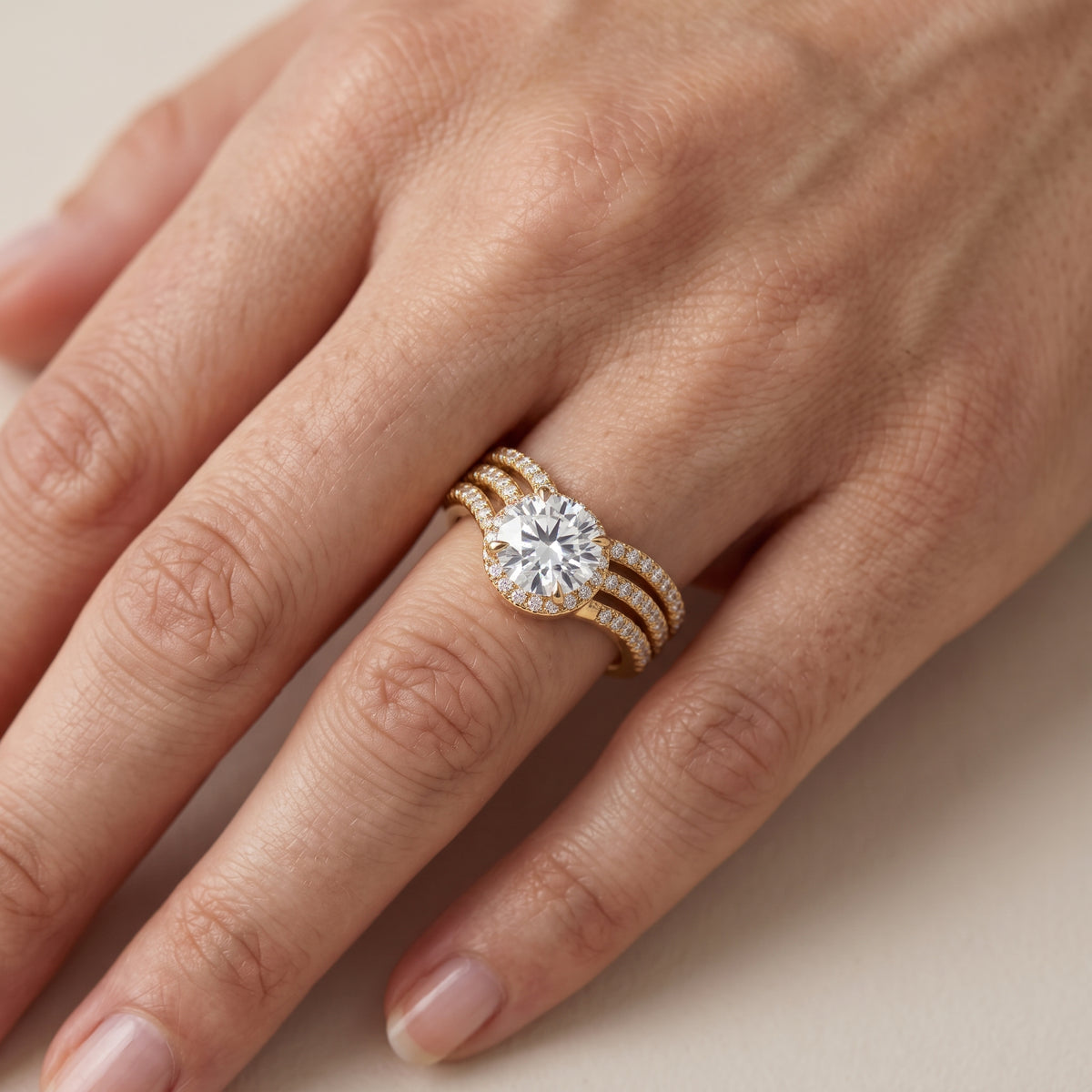 Francesca Chevron Halo Round Diamond Engagement Ring in White Gold - lifestyle.jpg