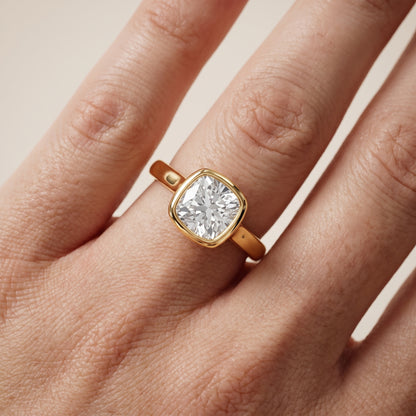 Jolie Bezel Solitaire Cushion Diamond Engagement Ring in Yellow Gold - lifestyle.jpg