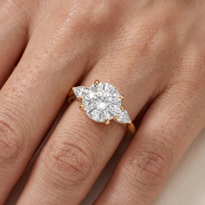 Leila Three-Stone Round Diamond Engagement Ring in Yellow Gold - lifestyle.jpg