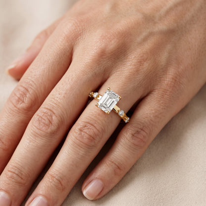 Elena Radiance Solitaire Emerald Diamond Engagement Ring in Yellow Gold - lifestyle.jpg