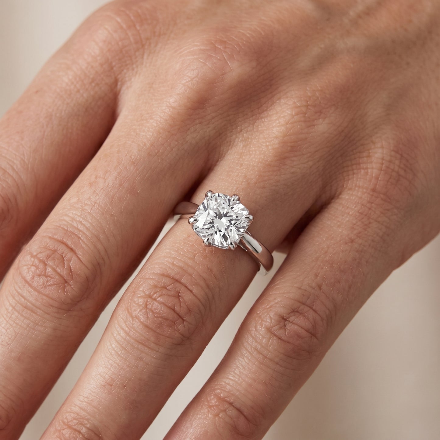 Lucia Solitaire Six-Prong Cushion Diamond Engagement Ring in White Gold - lifestyle.jpg