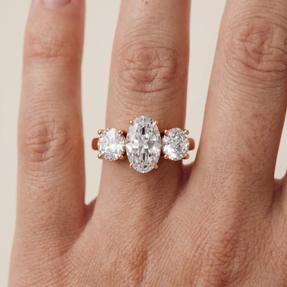 Esme Three-Stone Tapered Oval Diamond Ring in Rose Gold - lifestyle.jpg
