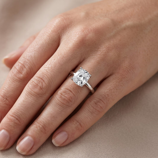 Maisie Four Prong Solitaire Cushion Diamond Engagement Ring in Platinum - lifestyle.jpg