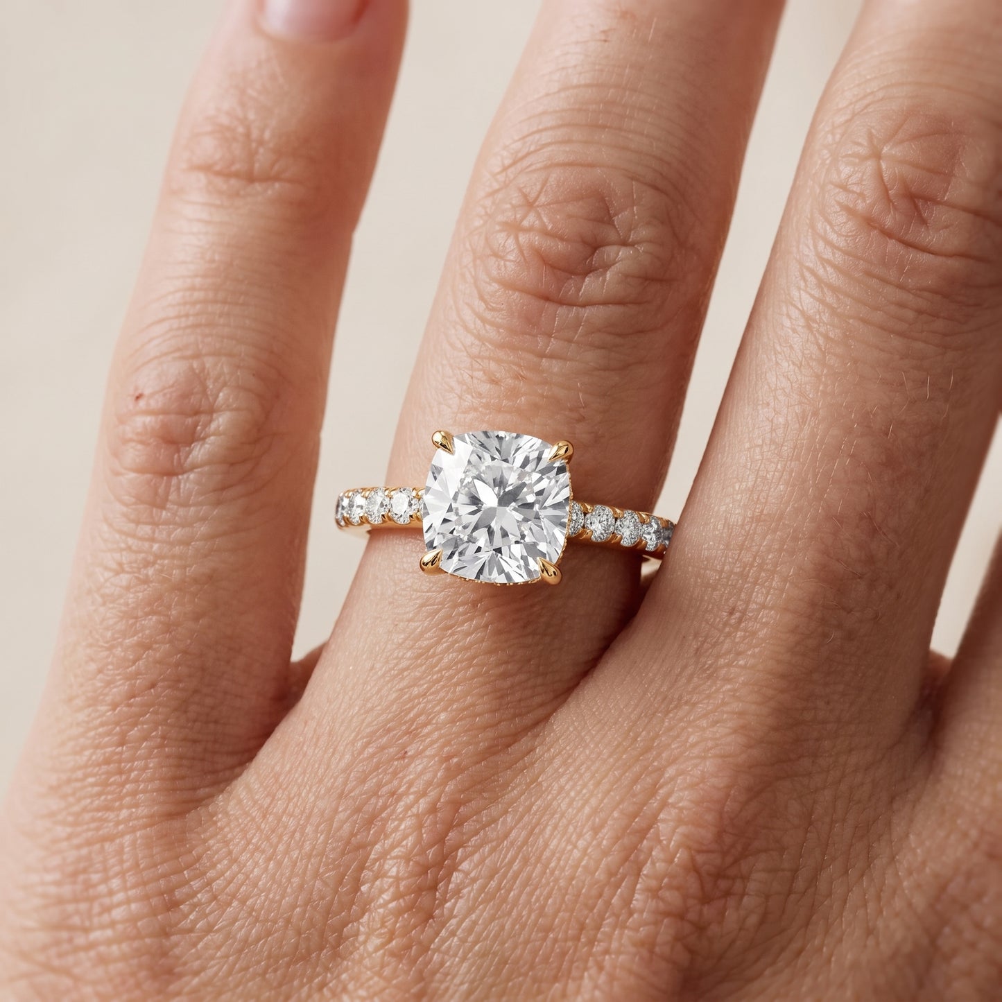 Thea Hidden Halo Pavé Cushion Diamond Engagement Ring in Yellow Gold - lifestyle.jpg