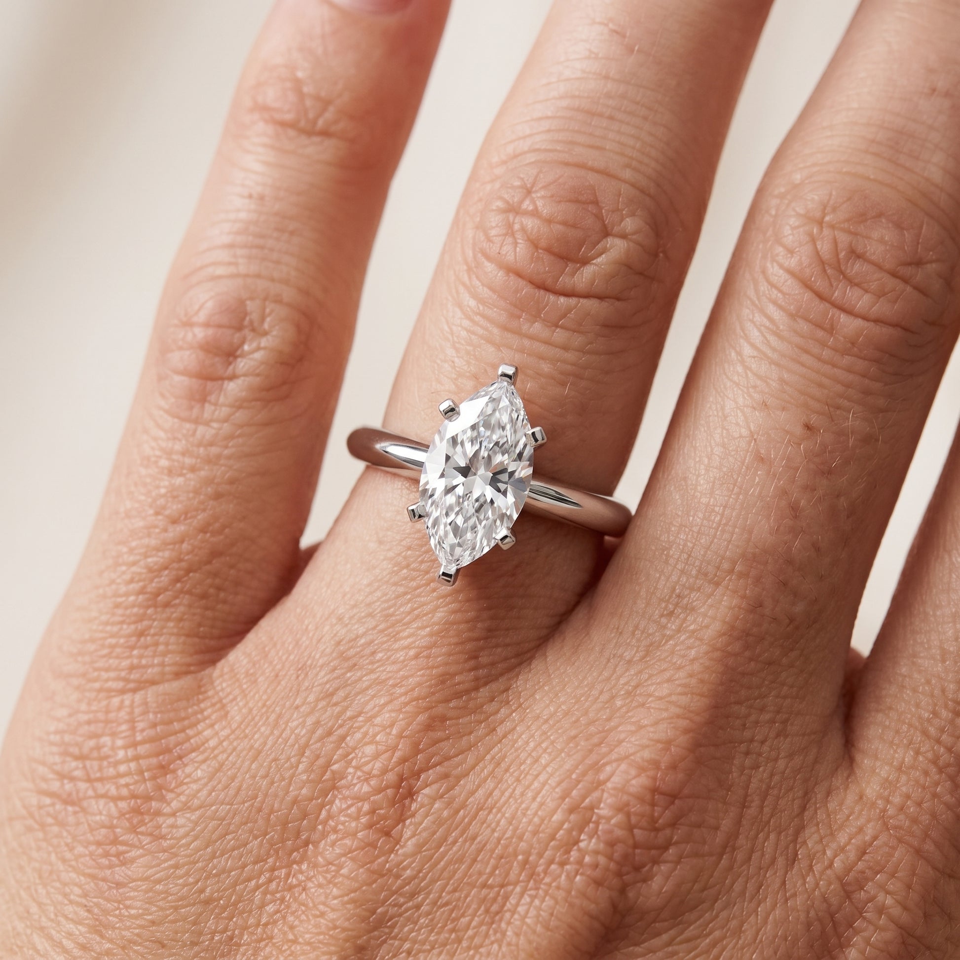 Amira Six-Prong Solitaire Marquise Diamond Engagement Ring in Platinum - lifestyle.jpg