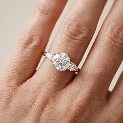 Mirabel Three-Stone Round Diamond Engagement Ring in Yellow Gold - lifestyle.jpg