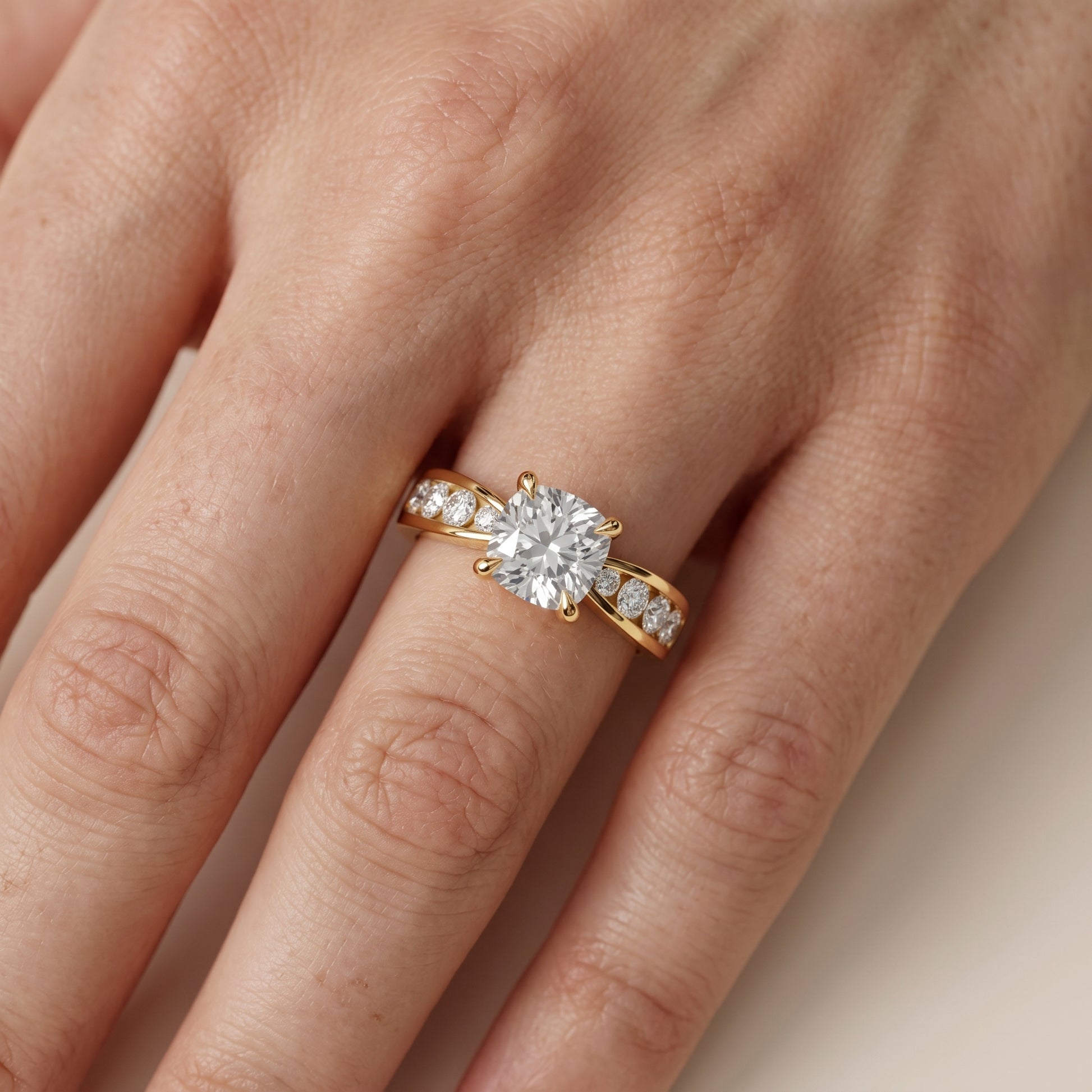 Noor Channel Set Sidestone Cushion Diamond Engagement Ring in Yellow Gold - lifestyle.jpg