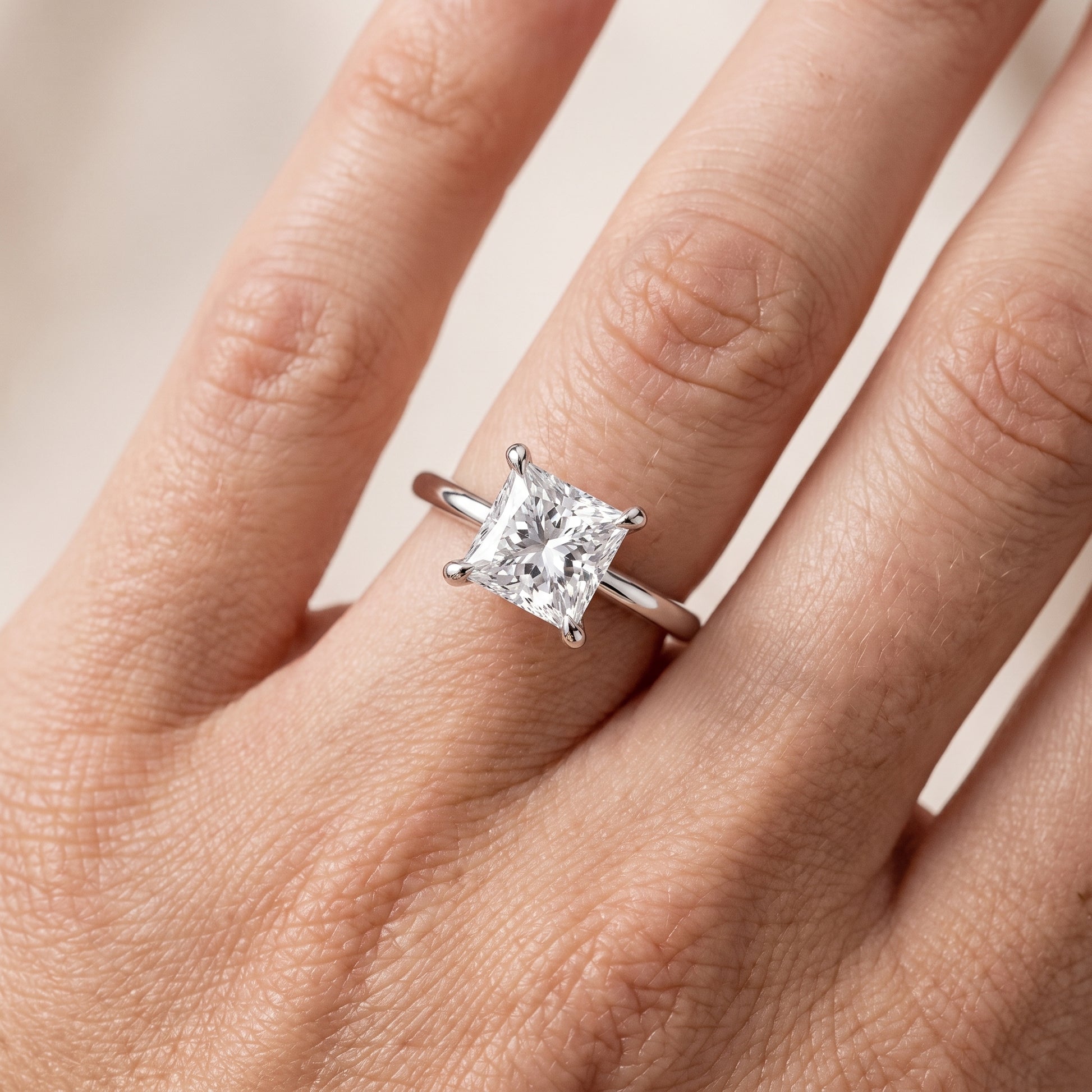 Nella Petite Solitaire Princess Diamond Engagement Ring in Silver - lifestyle.jpg