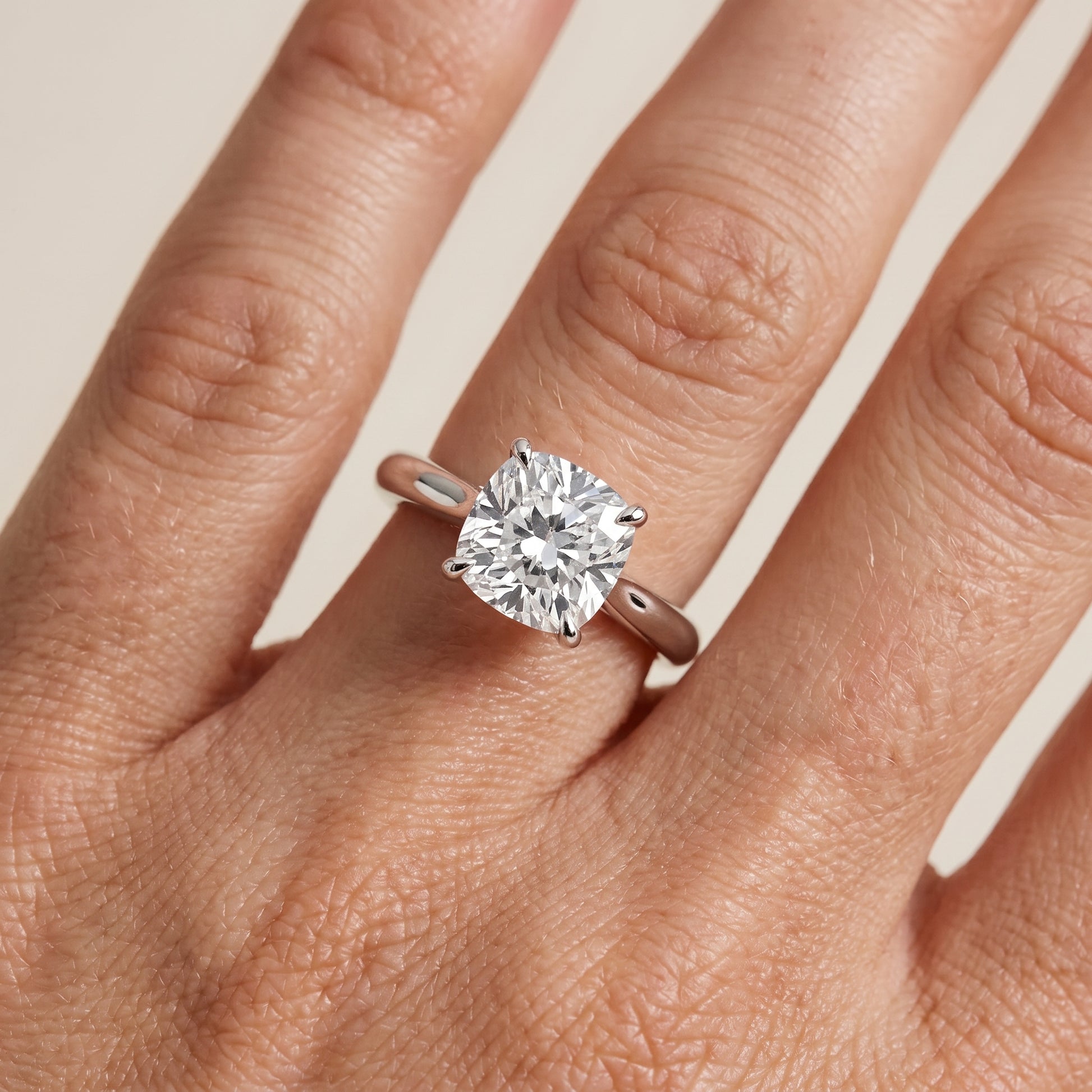 Kalia Knife Edge Solitaire Cushion Diamond Engagement Ring in Platinum - lifestyle.jpg