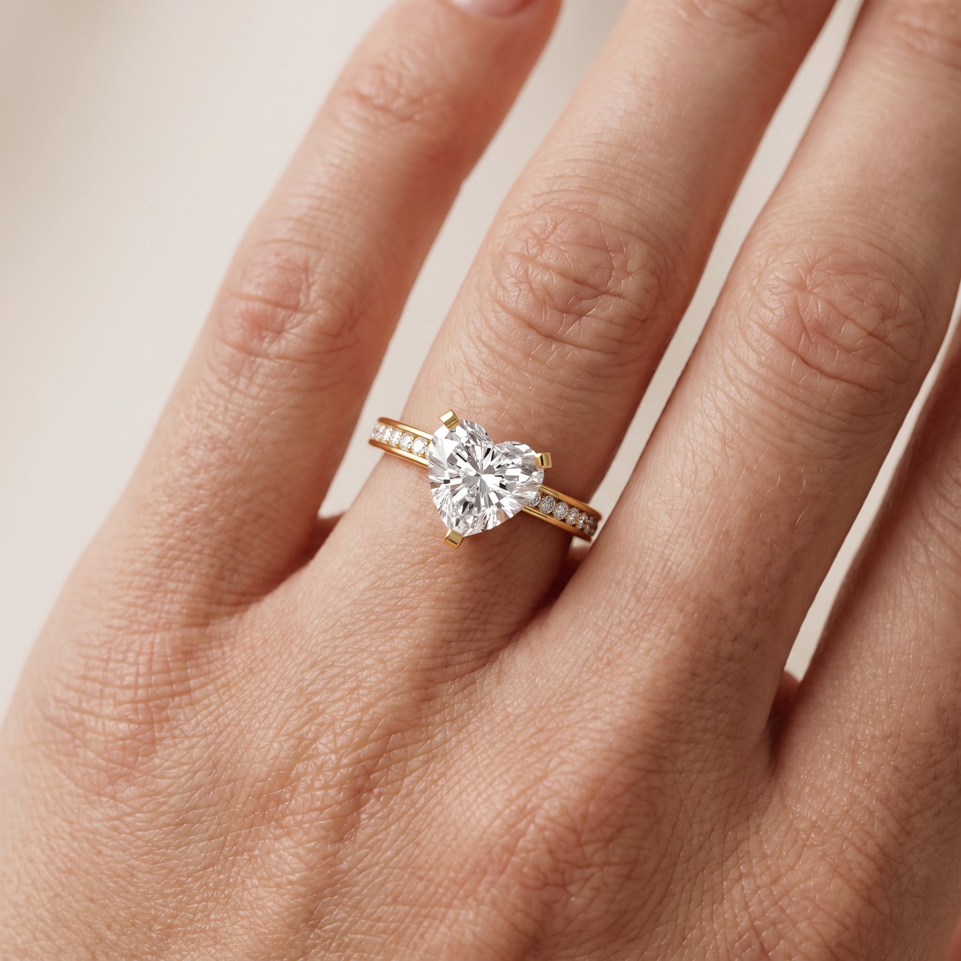 Tessa Solitaire Channel Set Heart Diamond Engagement Ring in Yellow Gold - lifestyle.jpg
