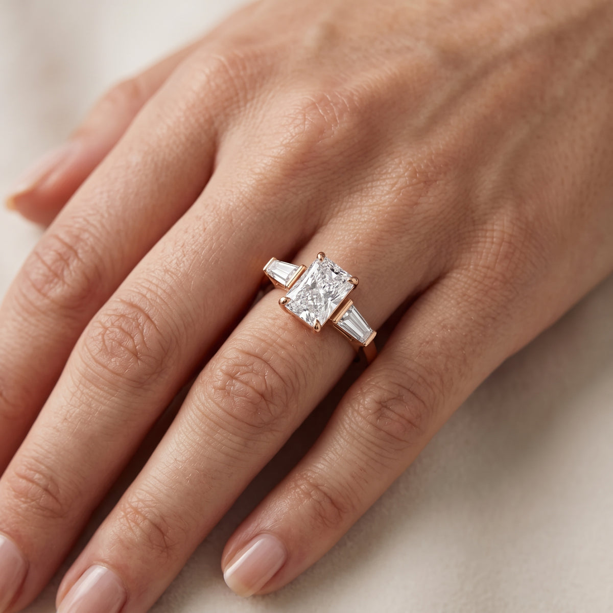Layla Tapered Baguette Radiant Diamond Engagement Ring in Rose Gold - lifestyle.jpg