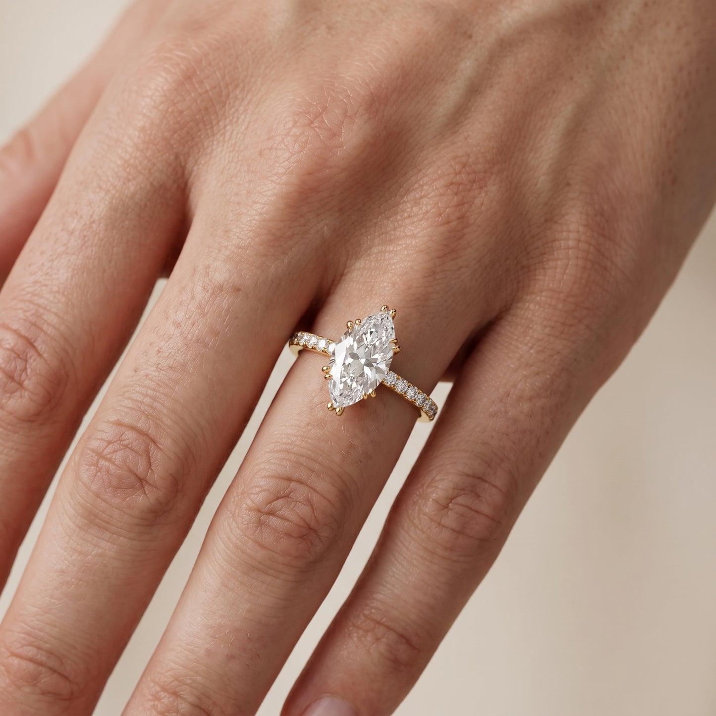 Novara Solitaire Pavé Marquise Diamond Ring in Yellow Gold - lifestyle.jpg