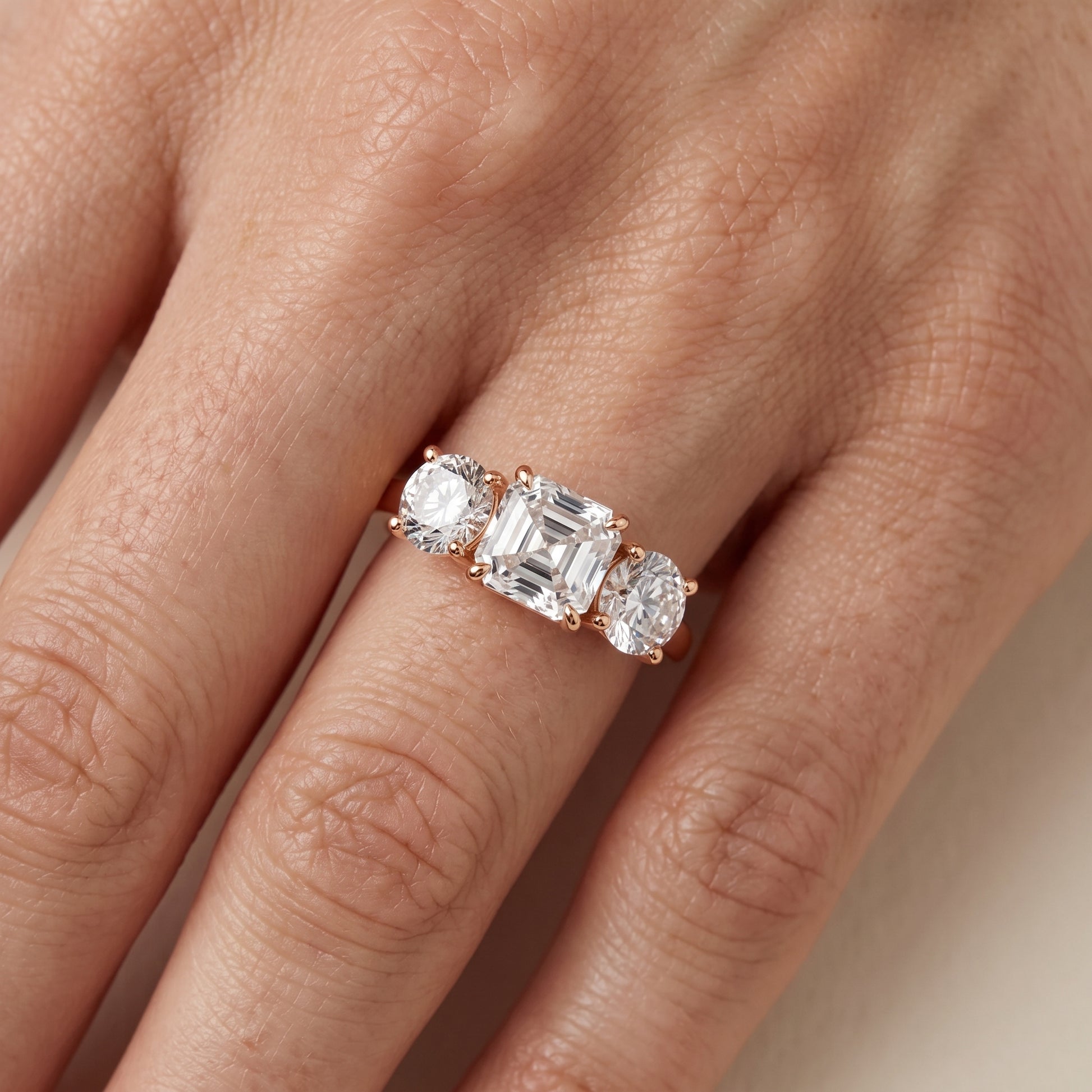Esme Three-Stone Tapered Asscher Diamond Ring in Rose Gold - lifestyle.jpg