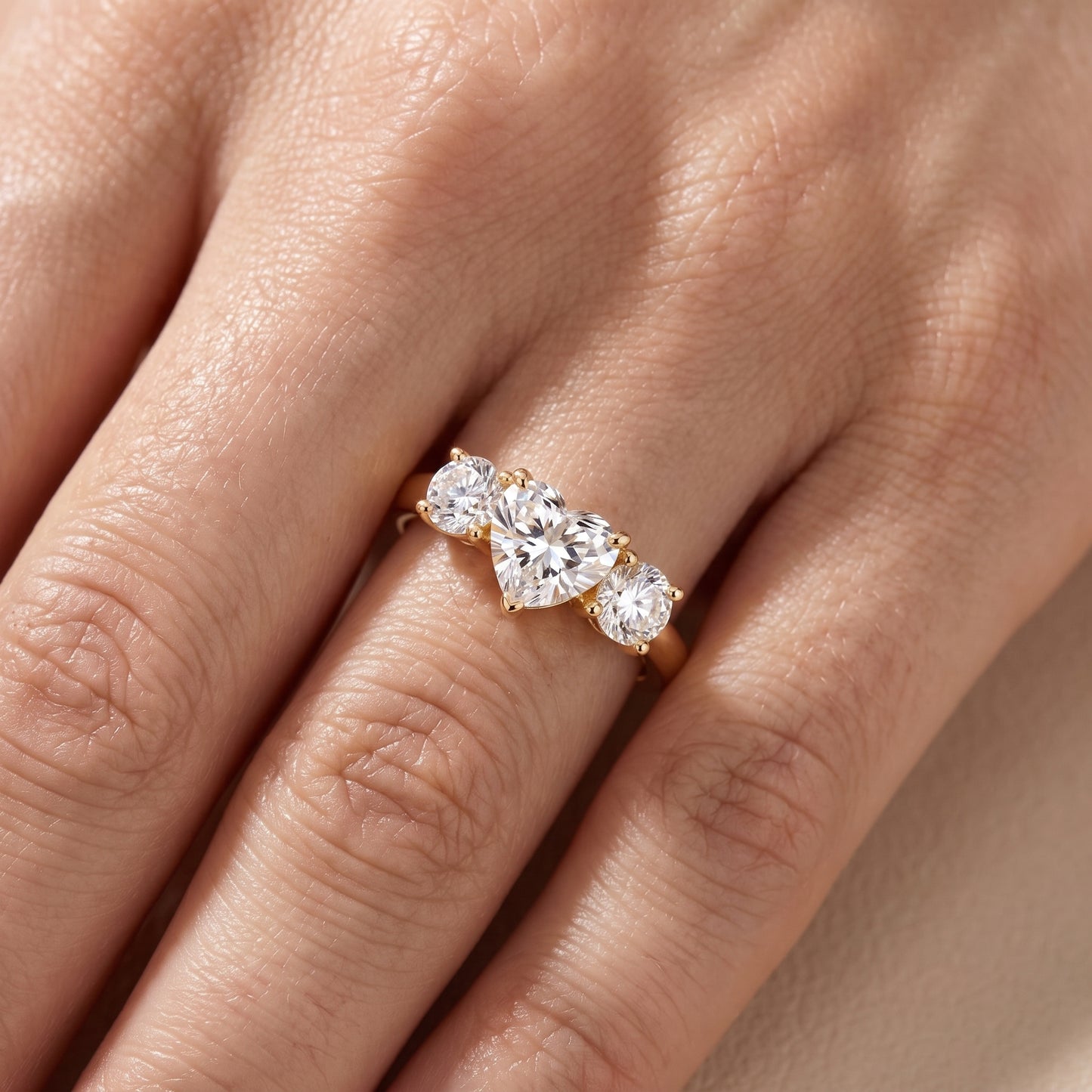 Callie Three-Stone Trellis Heart Diamond Engagement Ring in Yellow Gold - lifestyle.jpg