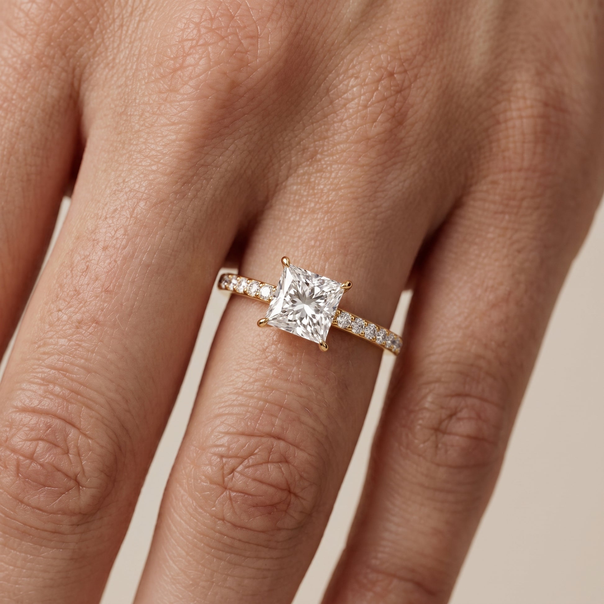 Aisha Pavé Solitaire Princess Diamond Engagement Ring in Yellow Gold - lifestyle.jpg