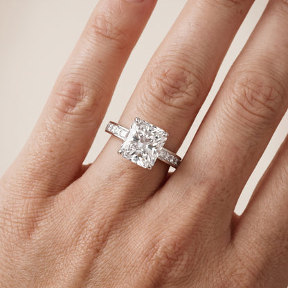 Brielle Channel Set Solitaire Radiant Diamond Ring in Platinum - lifestyle.jpg