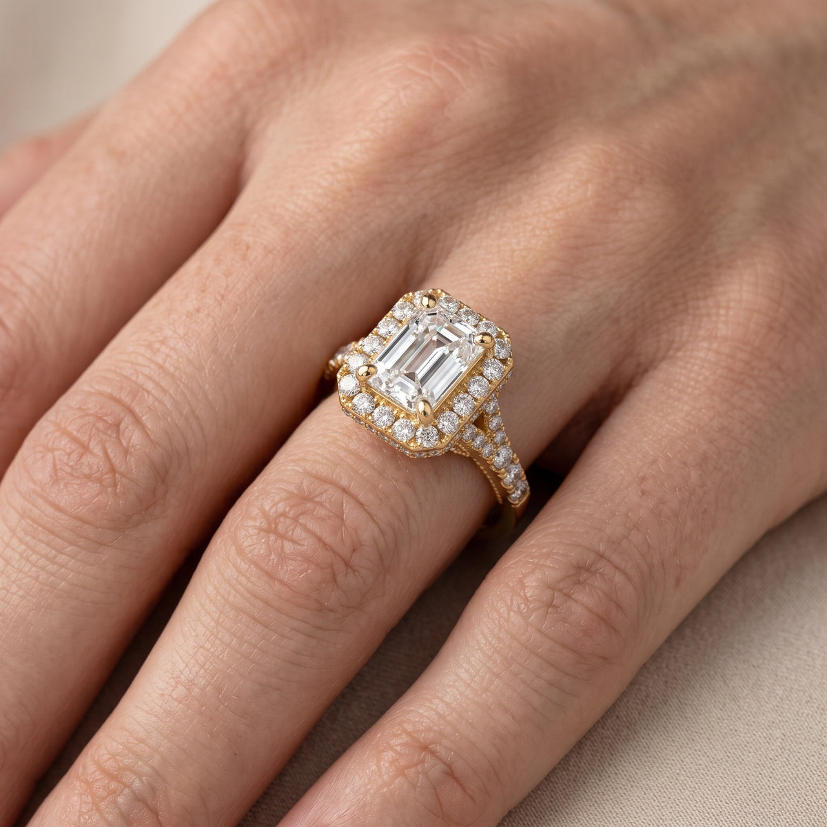 Kenner Halo Split Shank Emerald Diamond Engagement Ring in Platinum - lifestyle.jpg