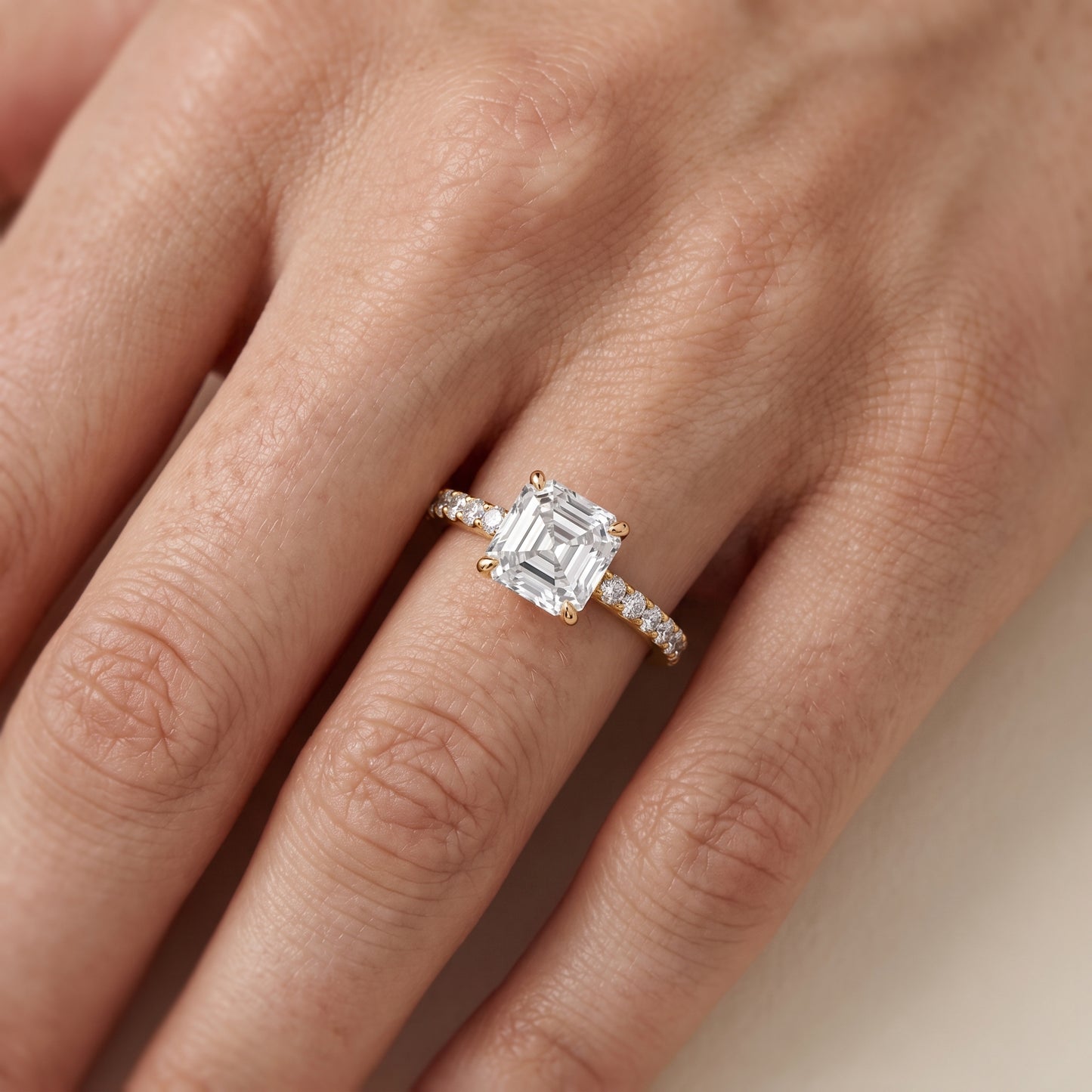 Aisha Pavé Solitaire Asscher Diamond Engagement Ring in Yellow Gold - lifestyle.jpg
