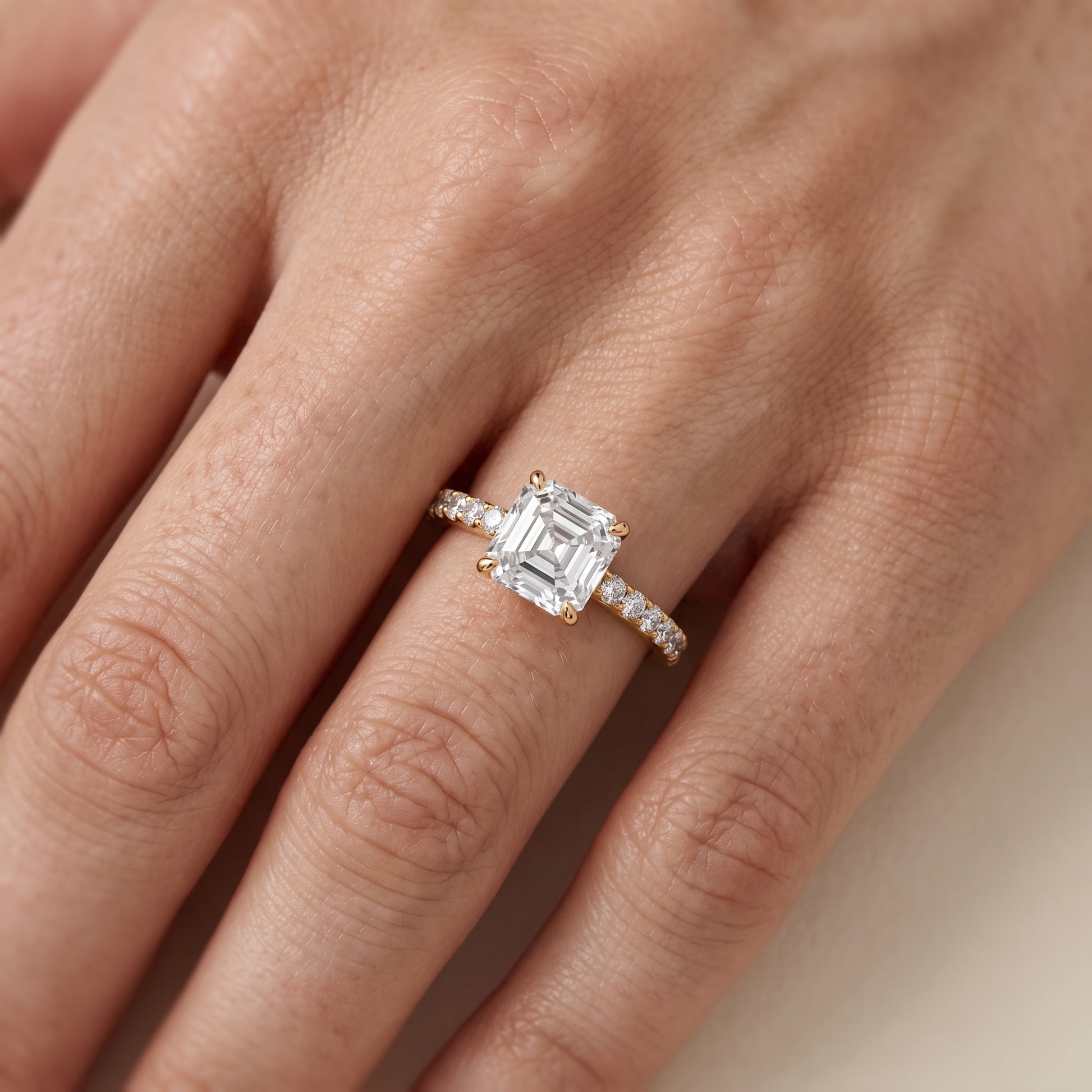 Aisha Pavé Solitaire Asscher Diamond Engagement Ring in Yellow Gold - lifestyle.jpg