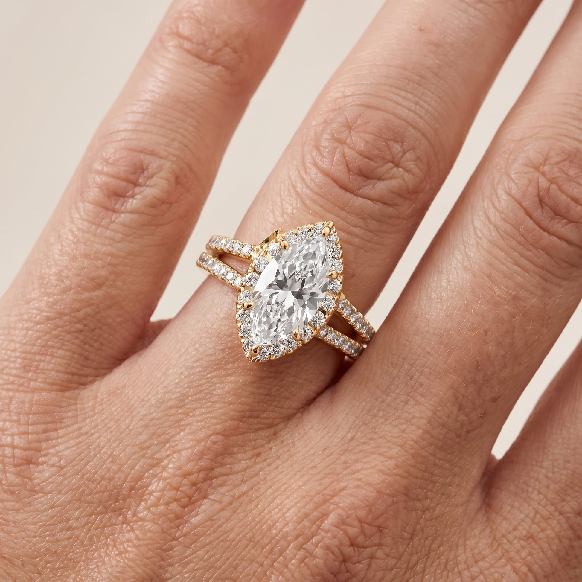 Kira Halo Split Shank Marquise Diamond Engagement Ring in Yellow Gold - lifestyle.jpg
