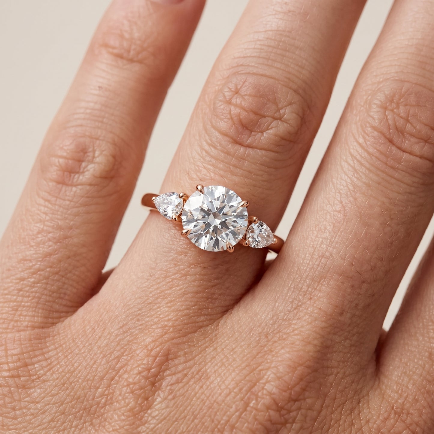 Phoebe Three-Stone Round Diamond Ring in Rose Gold - lifestyle.jpg